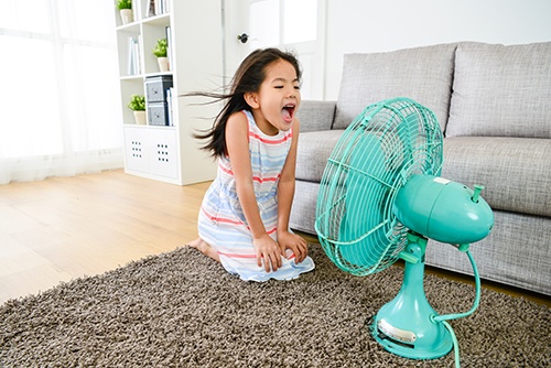 girl and fan