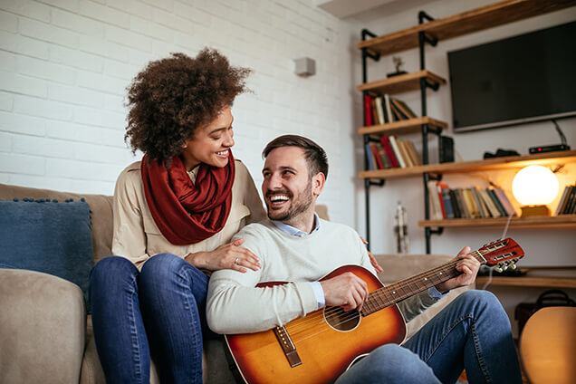 couple-in-heated-home-comfort-guitar